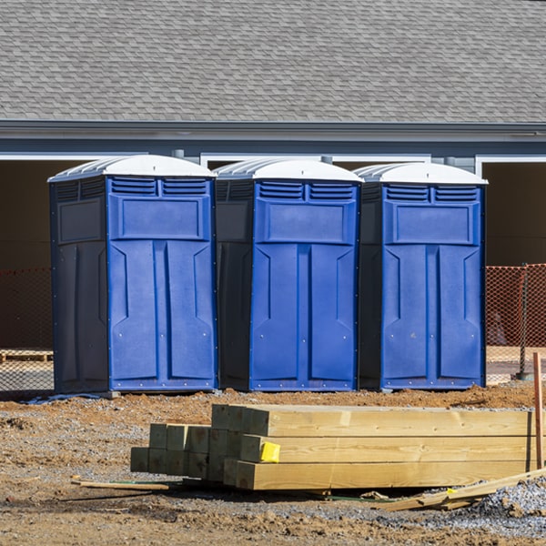 what is the maximum capacity for a single portable toilet in Needmore